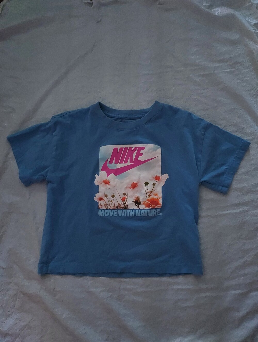 Nike Blue Short Sleeve Tee with Pink Logo and Floral Graphic